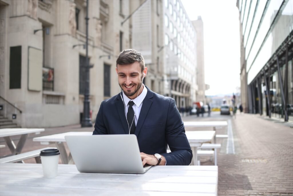 Photo by Andrea Piacquadio: https://www.pexels.com/photo/man-in-black-suit-jacket-using-macbook-3777559/