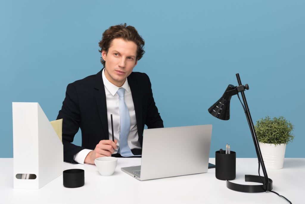 Photo by Moose Photos: https://www.pexels.com/photo/man-sitting-with-laptop-computer-on-desk-and-lamp-1586996/